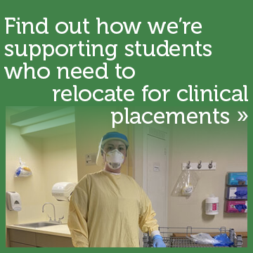Find out how were supporting students who need to relocate for clinical placements. Photo of a student dressed in Personal Protective Equipment working in their clinical placement.