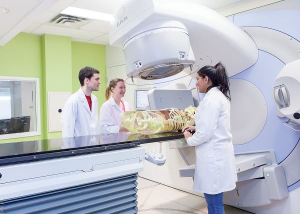 Michener Radiation Therapy students using the Linear Accelerator (LINAC)