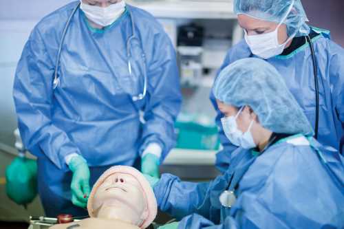 Michener Anesthesia Assistant students using a simulation manikin