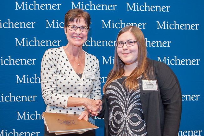 Danielle Nicole Grohn (right), winner of six scholarships, including the President Award, with professor Mary Emes.