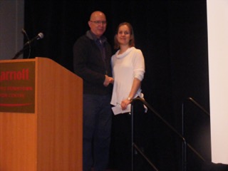 Mike Kiem (left) Treasurer of the Respiratory Therapy Society of Ontario (RTSO) awards 2015 respiratory therapy graduate Anna Nikolajewski with the RTSO Student Achievement Award