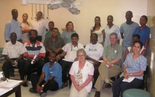 Laura Lee Kozody (back row, centre) with members of The Guyana Project team.