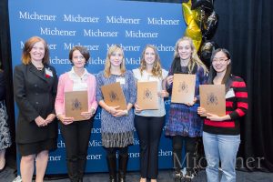 Iryna Kharchuk (second from L) with fellow Entrance Award recipients and Director, Student Enrolment & Registrar, Roni Srdic (L), at Michener Student Awards Ceremony in November. (Photo: Dao Shi)