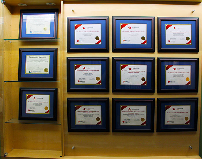 Michener accreditation certificates on display